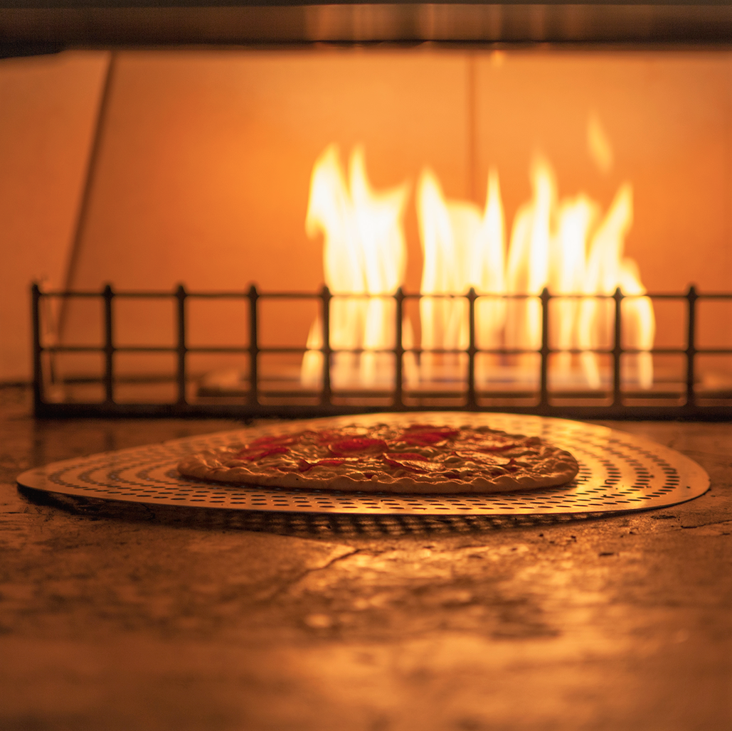 A pizza cooking.